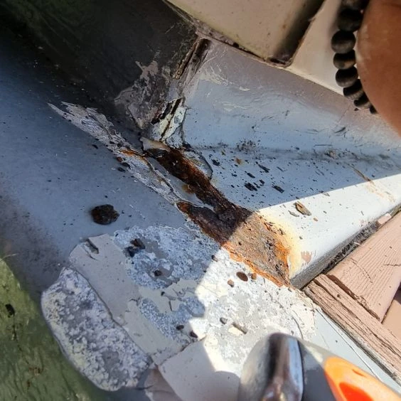 Close view of corrosion at a metal junction at Avoca Drive