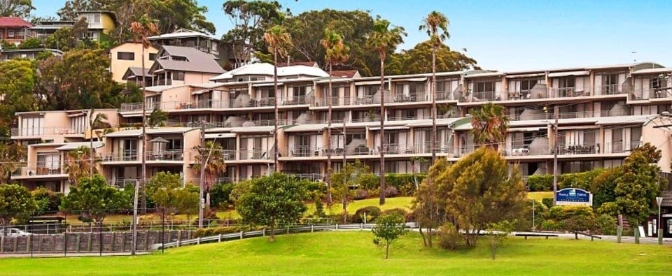 Avoca Palms Resort, with its full facade overlooking landscaped grounds