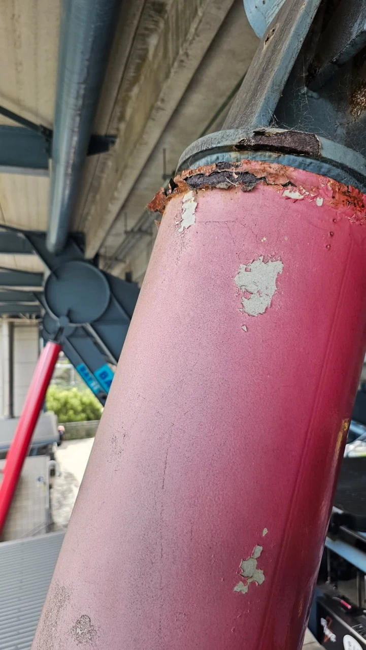 Coating wear on a red structural column
